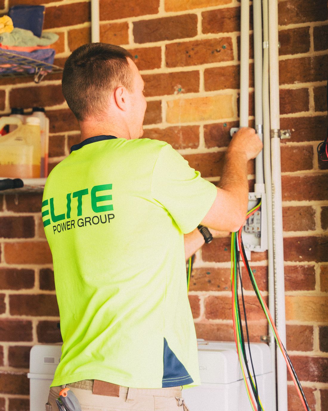 Electrician working on domestic electrical wiring